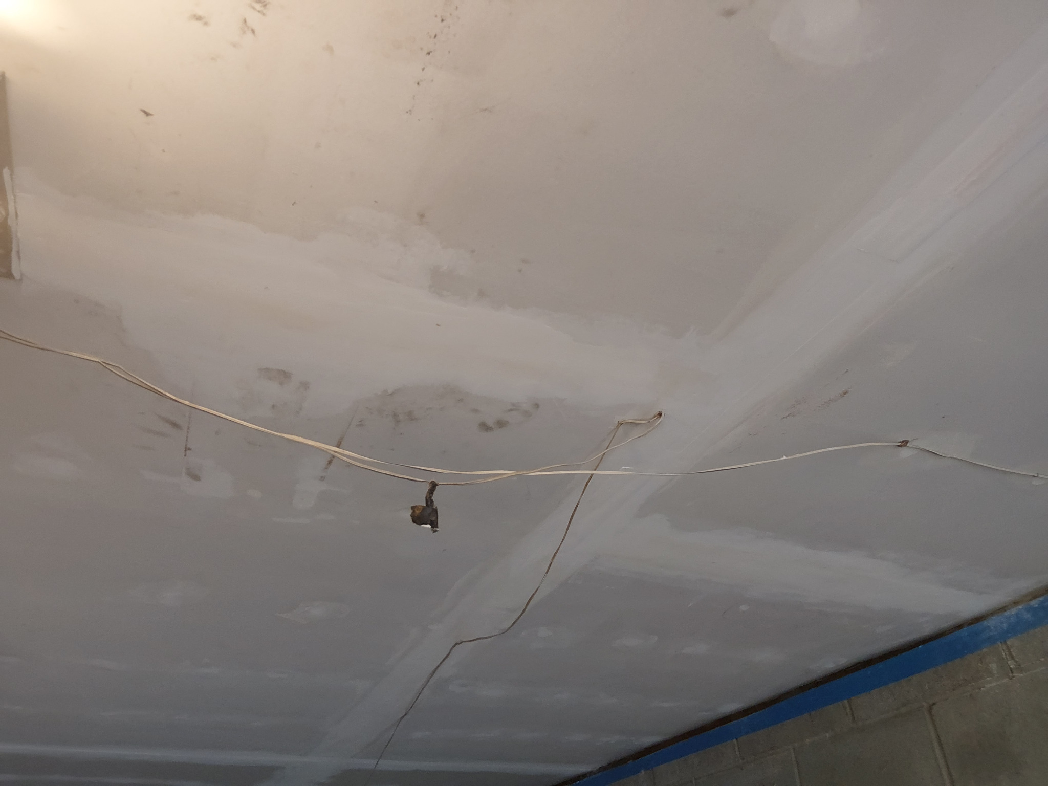 Ceiling compound finished and smoothed for sanding